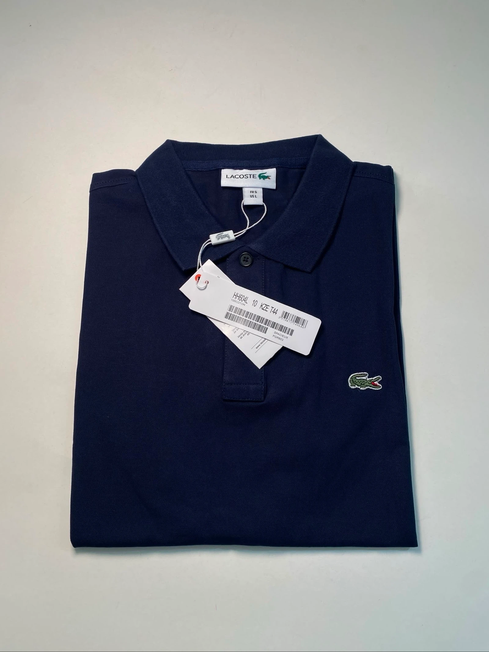Polo Lacoste bleu marine neuf avec étiquette 